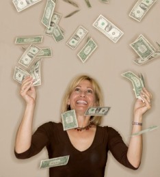 photo of lady tossing money in the air