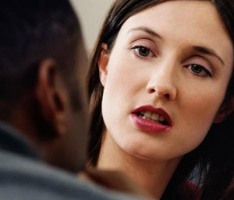 photo of woman interviewing a prospective employee