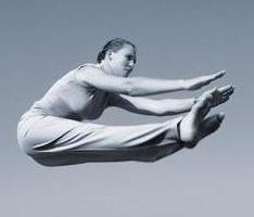 photo of man holding his ear
