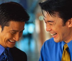 photo of two laughing men