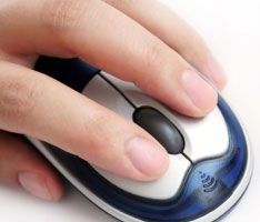 photo of a hand on a mouse