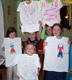 image of happy kids with painted t shirts 